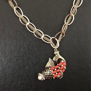 Necklace with maroon beaded fish